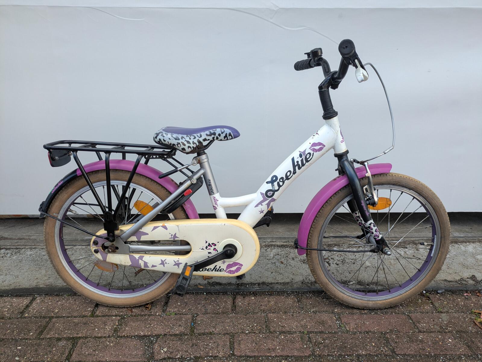18 inch Loekie Super Star met 1 handrem en een terugtraprem.